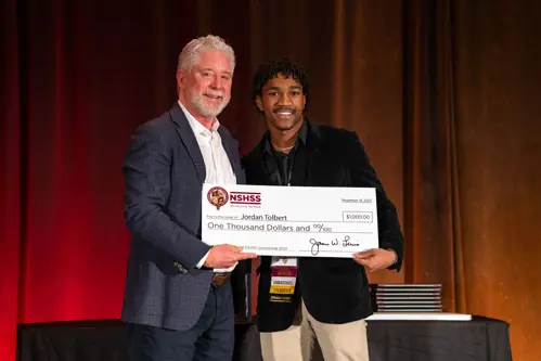 A happy scholarship recipient