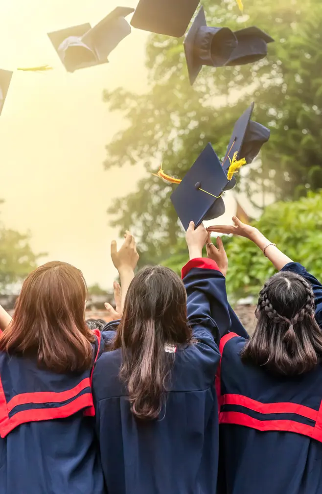 Studentsthrowinggradcaps_2023
